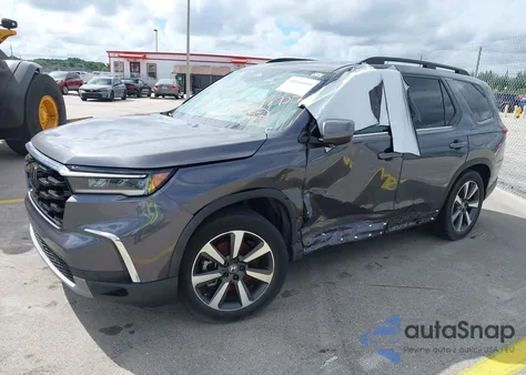 2023 Honda Pilot 2Wd Touring z USA, uszkodzony, nr VIN 5FNYG2H76PB008790